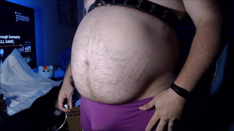 Akevantelico91: Belly inflation in purple boyshorts