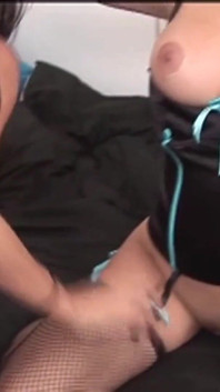 A Pretty Brunette Swallows a Big Dildo While Her Lesbian Friend Licks Her Cunt