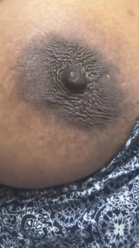 Playing with Her Nipple