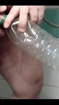 Superchub Pissing in Bottle