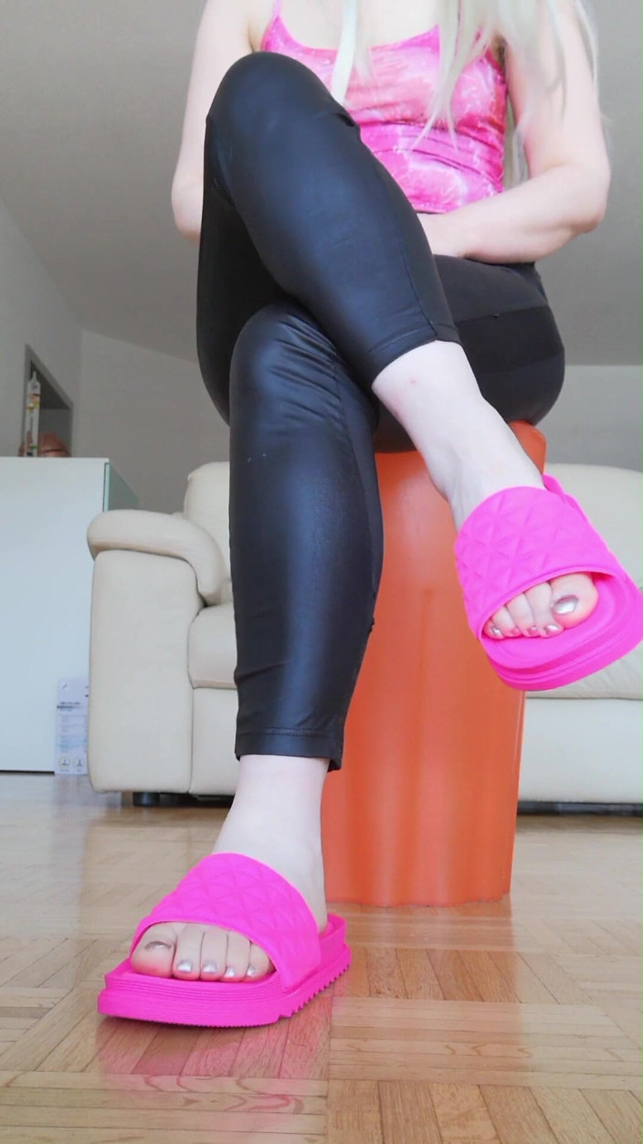RavenBigAss: Raven: Toe-tapping with Crossed Legs Latex Trousers and Fuchsia Slides