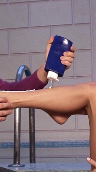 Sexy blonde skinny teen Jasmine giving footjob to stepbrother