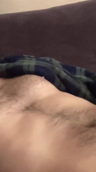 Wanking on the sofa
