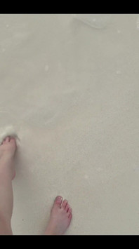 Running my bare feet on the white beach sand by the ocean.
