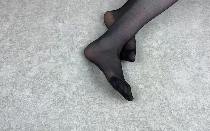 Gloria Gimson: Mistress Caresses Her Feet in Black Nylon Pantyhose