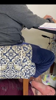 Kiffa Uses Slave as Footstool as She Uses Her Notebook
