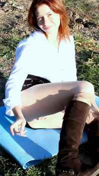 Redhead Smoking and Showing Her Ass, Legs and Pussy in Pantyhose