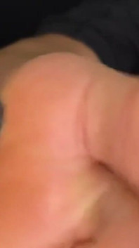 Ebony Girl Gives Her Feet a Massage with a Massage Gun