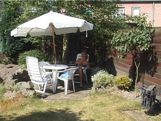 Lucky Cooch: Blonde milf showing off her boobs outdoors
