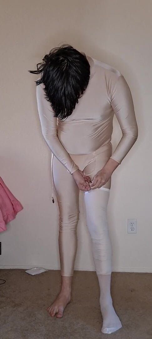 Pup Zentai: Pink spandex maid dress up