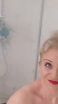 Older Blondie with Big Boobs Taking Steamy Shower