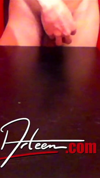 Standing Slim Twink Jon Arteen Wanks His Cock with Oil and Squirts a Lot of Cum Away on the Table Moaning, Front View