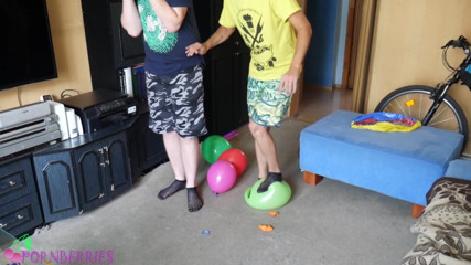 Ethan Alex: Thin, black socks blowing up balloons + footjob