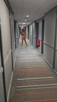 Naked in the Village Hotel Corridor