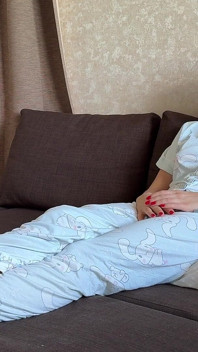 Farting in Pajamas on a Pillow While Sitting on the Couch