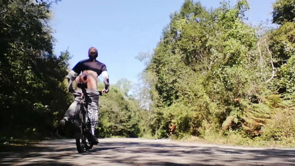 Culopeke: Slim boy with his bike in the park