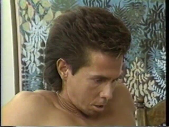 Old Good Porn: The hung stud sits on the edge of the bed...