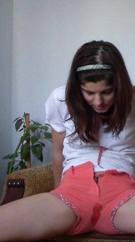 Sexy Teen Has Full Bladder and She Is Desperate to Pee so She Empty Her Bladder in Her Short Pants