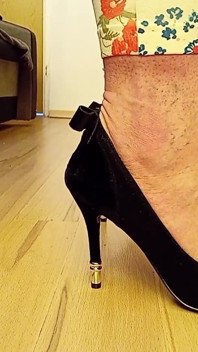 Crossdresser Walking in Sexy Black Suede Pointed Toe High Heels Pumps with a Bow on the Heel