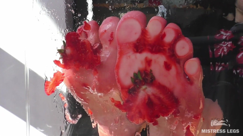 Mistress Legs: Mistress barefoot soles rubbing against the glass and squeezing strawberries