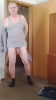 Andreas with suspender belt and bra jerking off