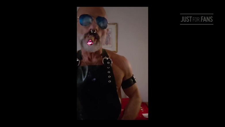 MusclesCigarsFFPig: Stepdad lighting his Cigar in rubber apron