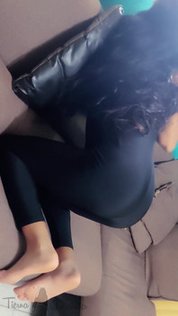 Housewife with Bare Feet and Tight Yoga Pants Is Waiting for You to Fulfill Your Desires