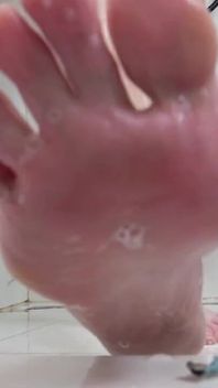 Worship Under Giantess Feet