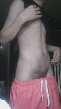 Skinny Boy Teasing His Abs on Camera