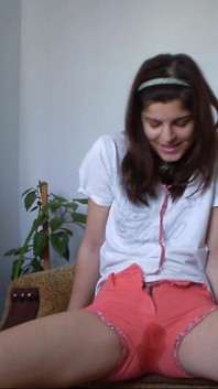 Sexy Teen Has Full Bladder and She Is Desperate to Pee so She Empty Her Bladder in Her Short Pants