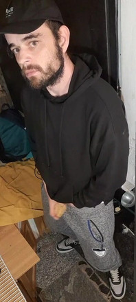 I Masturbate in Sweatpants, a Black Sweatshirt and Nike Sneakers