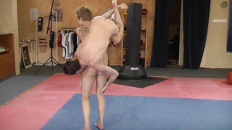 European Lift and Carry Club: After wrestling match she gives him nice blowjob