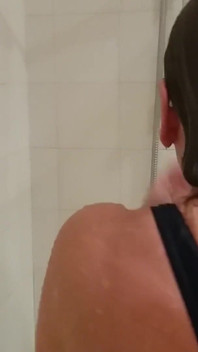 Grandma in a Tight Swimsuit Taking a Shower!