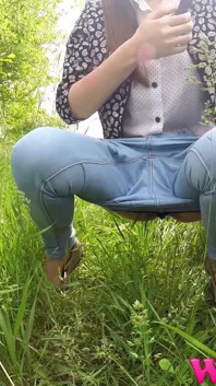 Full Bladder Skinny Brunette Pissing in the Woods in the Tall Grass