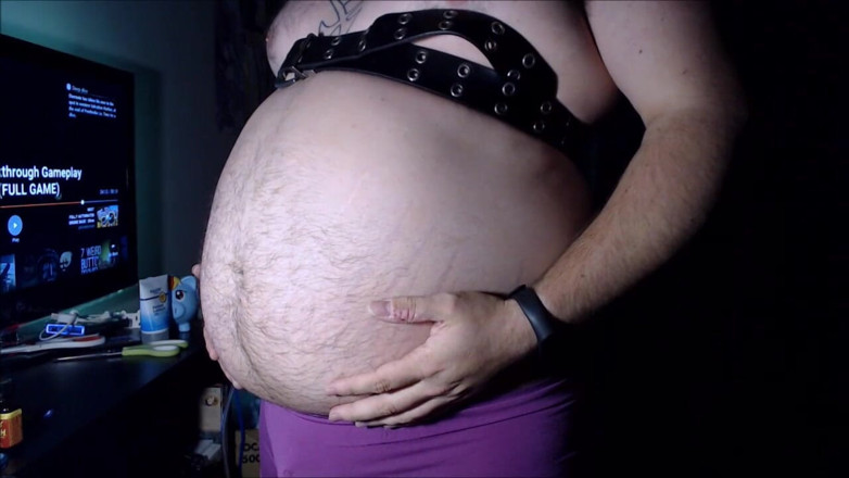 Akevantelico91: Belly inflation in purple boyshorts