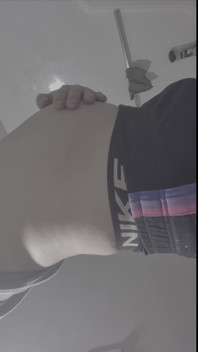 Young Man Holds a Full Bladder