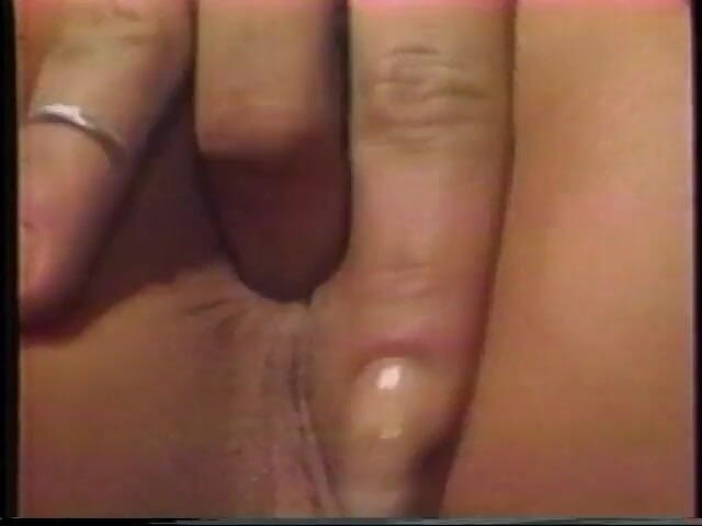 A Lesbian World: Cute babe bends over to sucks a dildo as her...