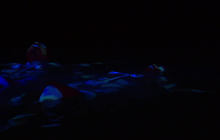Radical Lesbian: fluorescent body paint girls.