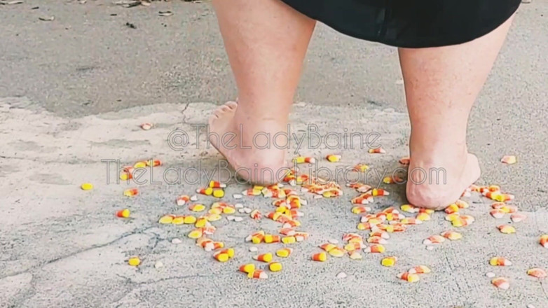 TheLadyBaine: SSBBW barefoot demoness candy corn crushing