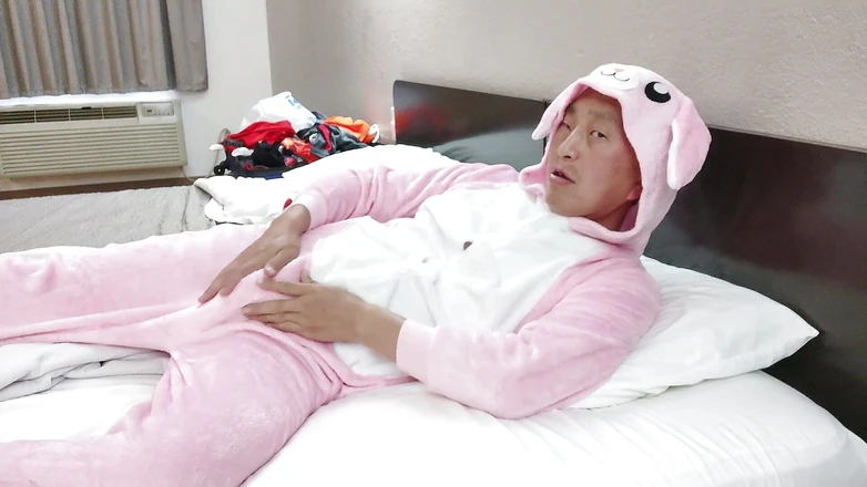 CockyRocky: Hot Asian posing in my new pink onesie and zippered...