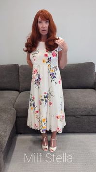 A Redhead in a Dress