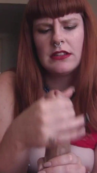Big booty redhead jerks you off