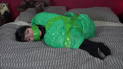 Restricting Ropes: Green tape bondage