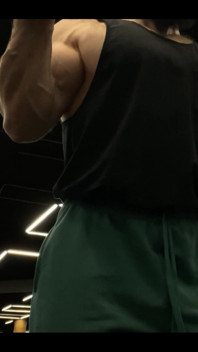 Doing a Biceps Curls with a Straight Barbell