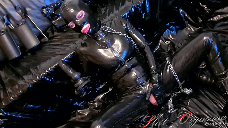 Slut Orgasma Celeste: Slave slut-Orgasma Celeste in latex drool squirting on black dildo