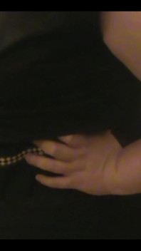 Robe-wearing Dominatrix