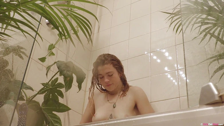 Girls Out West: Sexy tattooed amateur Pixie fucks her hairy pussy in shower