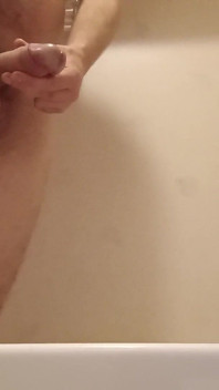 Standing in Bathtub