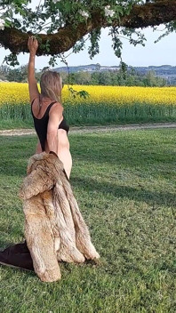 A Super-hot Granny in a Racy Thong Bodysuit!