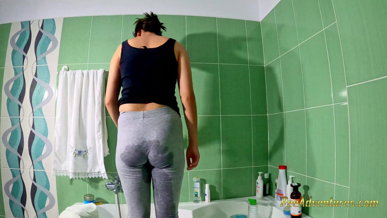 Pee Adventures: Desperate girl pissing in her tights while cleaning the house